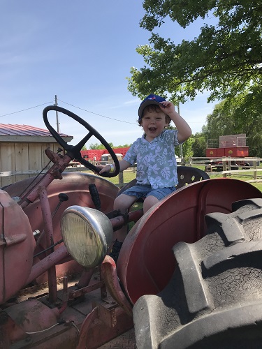 Sitting on top of a tractor