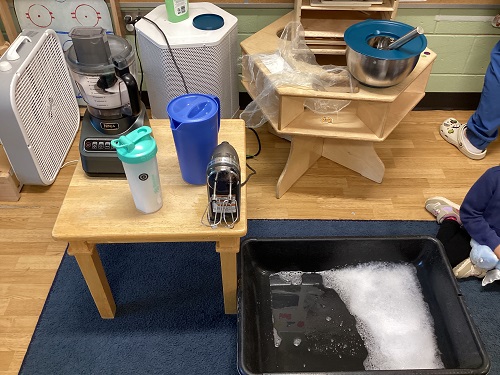 Different ways to make bubbles set out for the children to examine
