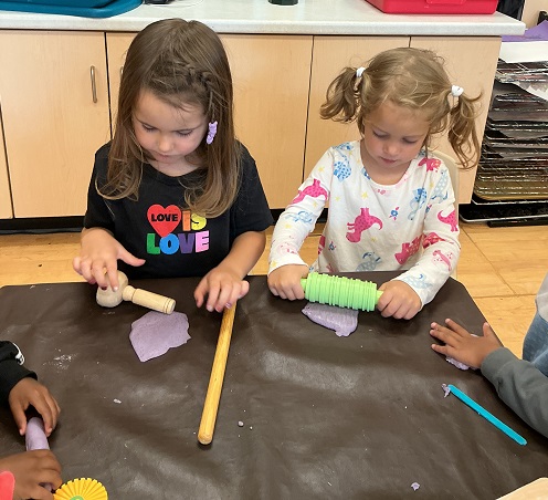 children playing with playdough